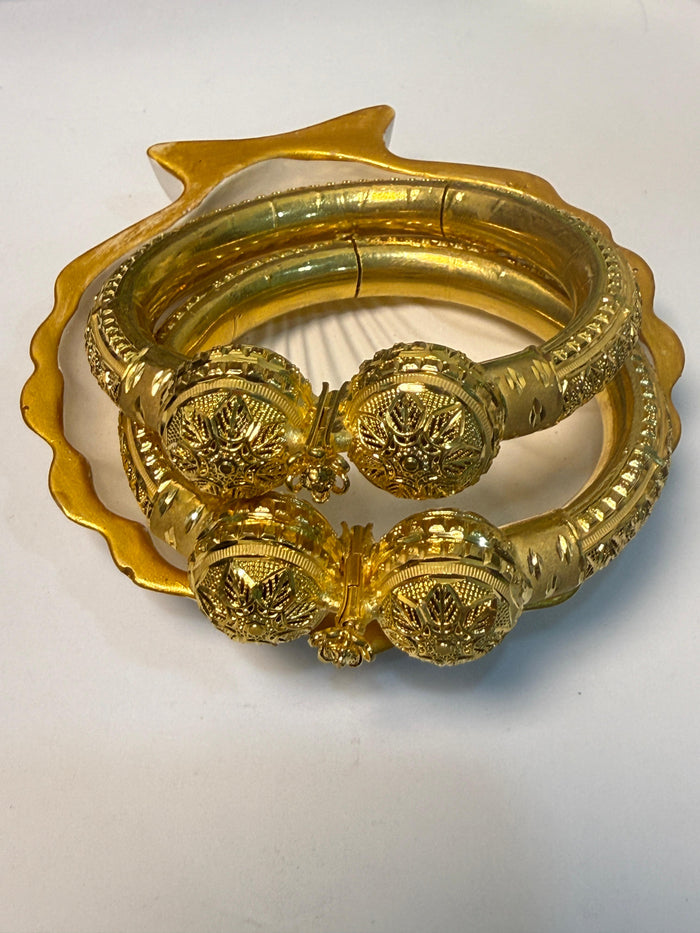 Elegant Golden Bangle Set by ZEVAR GALLERY