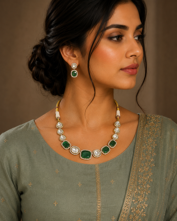 Emerald cushion-cut polki necklace on gold rope chain with matching earrings