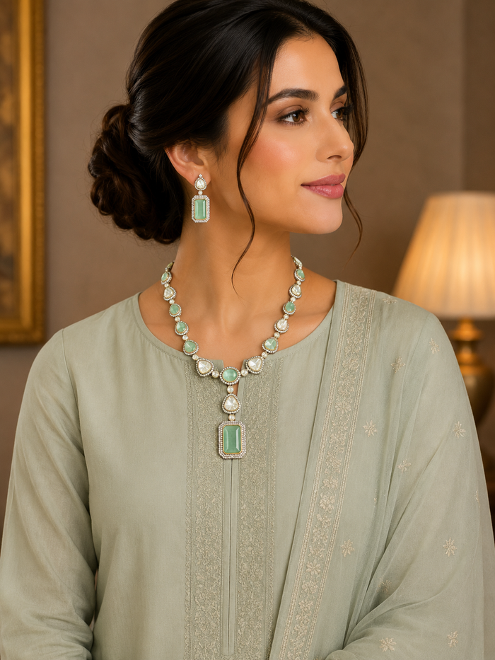 Mint-green emerald-cut pendant necklace with matching earrings, silver-tone